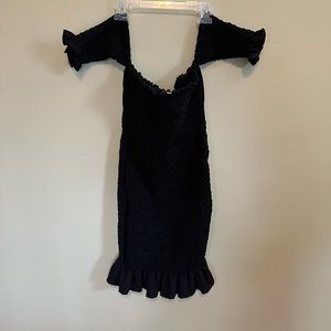 Black strapless tight dress with sleeve design, never worn